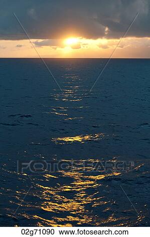 Stock Image - East China Sea at sunset. Fotosearch
