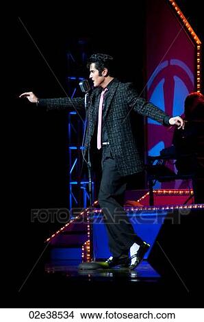 Elvis Presley impersonator performing in Branson, Missouri, U. S. Ao View Large Photo Image Picture - Elvis Presley impersonator performing in Branson, Missouri, U. S. Ao. Fotosearch