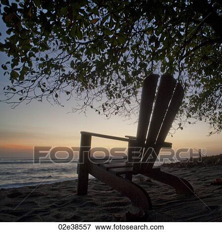 Empty chair on the Costa Rica seashore View Large Photo Image Stock Photo - Empty chair on the Costa Rica seashore. Fotosearch