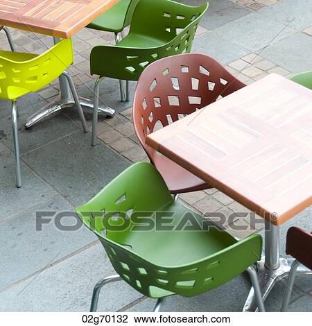 Empty chairs and tables at a sidewalk cafe, Bergen, Norway View Large Photo Image Stock Image - Empty chairs and tables at a sidewalk cafe, Bergen, Norway. Fotosearch
