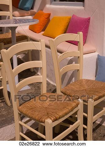 Empty chairs in Mykonos Greece View Large Photo Image Stock Image - Empty chairs in Mykonos Greece. Fotosearch
