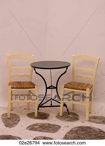 Empty table and chairs in Mykonos Greece View Large Photo Image Picture - Empty table and chairs in Mykonos Greece. Fotosearch