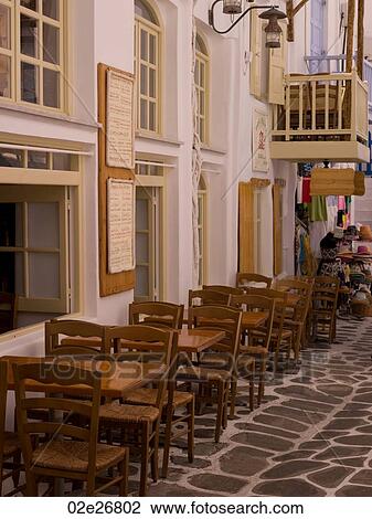 Empty table and chairs in Mykonos Greece View Large Photo Image Stock Image - Empty table and chairs in Mykonos Greece. Fotosearch