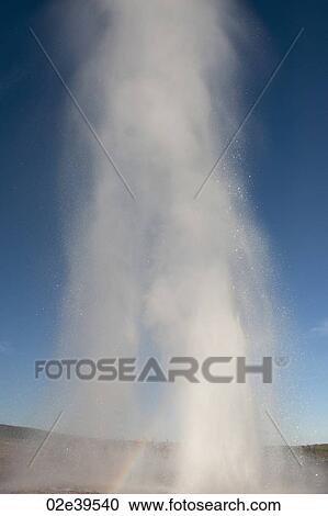 Stock Image - Erupting geyser in Iceland. Fotosearch