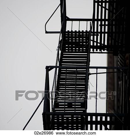 Exterior fire escape on a building in Manhattan, New York City, U. S. A. View Large Photo Image Stock Photograph - Exterior fire escape on a building in Manhattan, New York City, U. S. A.. Fotosearch