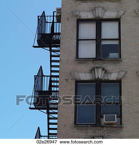 Exterior fire escape on building in Manhattan, New York City, U. S. A. View Large Photo Image Stock Photo - Exterior fire escape on building in Manhattan, New York City, U. S. A.. Fotosearch