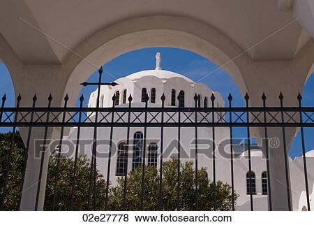 Fence with view of church dome in Santorini Greece View Large Photo Image Stock Photo - Fence with view of church dome in Santorini Greece. Fotosearch