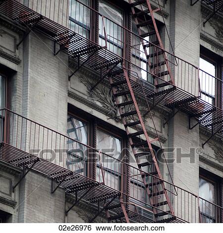 Fire escape on the exterior of a building in Manhattan, New York City, U. S. A. View Large Photo Image Stock Photograph - Fire escape on the exterior of a building in Manhattan, New York City, U. S. A.. Fotosearch