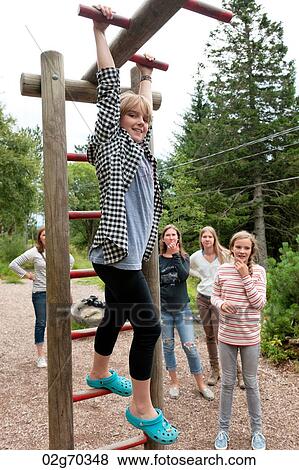 Five female friends having fun in a park, Bergen, Norway View Large Photo Image Stock Photo - Five female friends having fun in a park, Bergen, Norway. Fotosearch