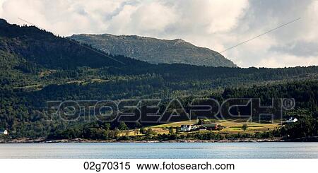 Fjord with mountain range in the background, Sognefjord, Norway View Large Photo Image Stock Photography - Fjord with mountain range in the background, Sognefjord, Norway. Fotosearch