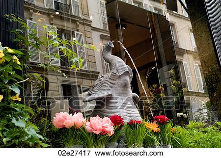 Fountain and flowers in Paris France View Large Photo Image Stock Photo - Fountain and flowers in Paris France. Fotosearch