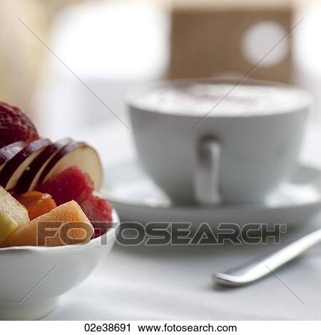 Fresh fruit and cappuccino cup on a table setting in Costa Rica View Large Photo Image Stock Image - Fresh fruit and cappuccino cup on a table setting in Costa Rica. Fotosearch