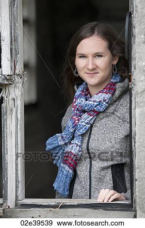 Front view of a brunette teenager wearing a scarf in Iceland View Large Photo Image Stock Photo - Front view of a brunette teenager wearing a scarf in Iceland. Fotosearch