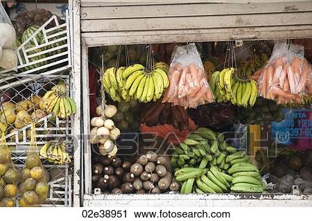 Fruit and vegatable stand, with banans, carrots, onions, melons, View Large Photo Image Stock Image - Fruit and vegatable stand, with banans, carrots, onions, melons, . Fotosearch