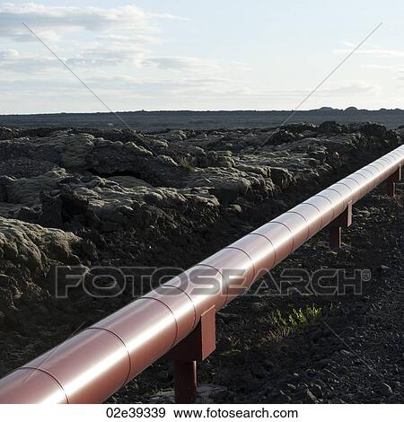 Stock Photo - Geothermal heating pipe through Icelandic rural countryside. Fotosearch