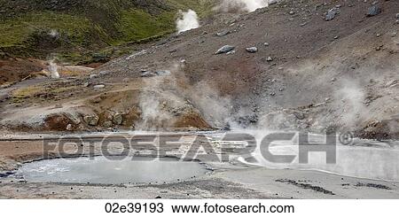 Geothermal water ponds steaming next to rocky slope View Large Photo Image Stock Image - Geothermal water ponds steaming next to rocky slope. Fotosearch