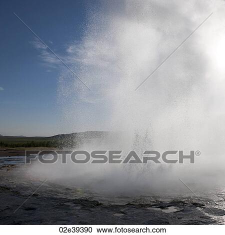 Geyser erupting into steam and droplets View Large Photo Image Stock Image - Geyser erupting into steam and droplets. Fotosearch