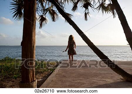 Stock Image - Girl at Manda Bay Resort. Fotosearch