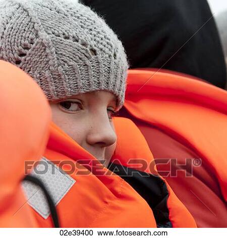 Girl in fluorescent orange life preserver and knit lace cap View Large Photo Image Stock Image - Girl in fluorescent orange life preserver and knit lace cap. Fotosearch