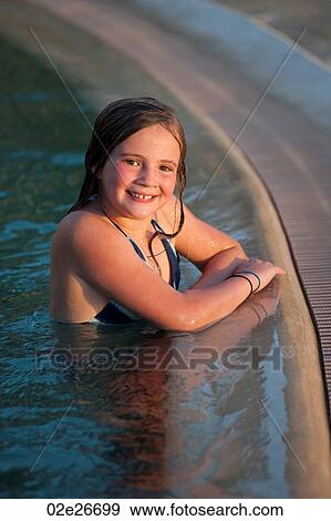 Girl in swimming pool in Kenya View Large Photo Image Stock Photo - Girl in swimming pool in Kenya. Fotosearch