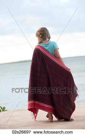 Girl on beach in Kenya View Large Photo Image Stock Photo - Girl on beach in Kenya. Fotosearch