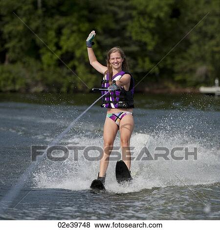 Girl on waterskis at Lake of the Woods, Ontario View Large Photo Image Stock Photo - Girl on waterskis at Lake of the Woods, Ontario. Fotosearch