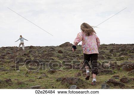 Girl running in field in Kenya View Large Photo Image Picture - Girl running in field in Kenya. Fotosearch