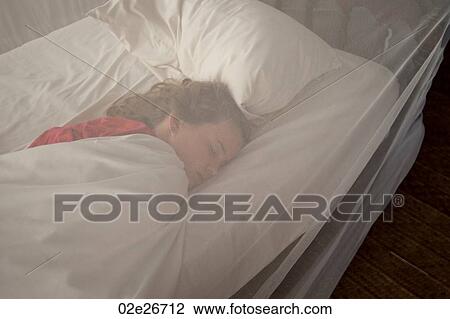 Stock Image - Girl sleeping at Manda Bay Resort. Fotosearch
