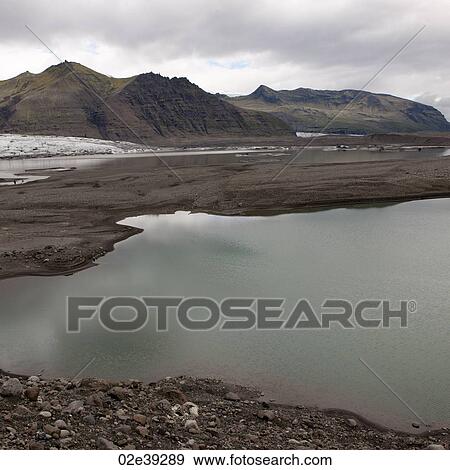 Glacial lake and plain, mountains View Large Photo Image Stock Photo - Glacial lake and plain, mountains. Fotosearch