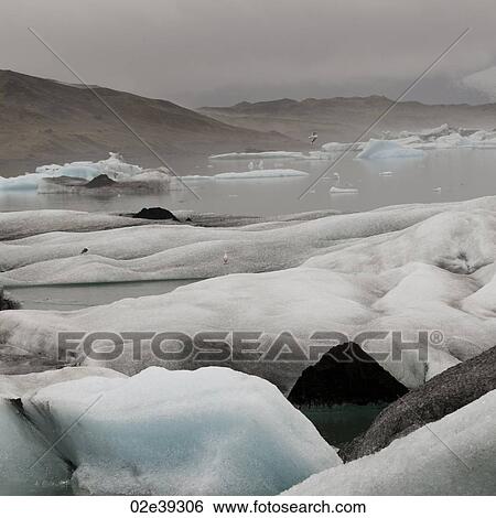 Stock Photograph - Glacier and iceberg. Fotosearch