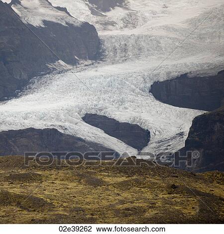 Glacier in mountain valley View Large Photo Image Stock Image - Glacier in mountain valley. Fotosearch