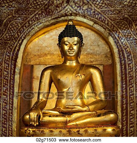 Stock Image - Golden statue of Buddha at Wat Phra Singh, Chiang Mai, Thailand. Fotosearch