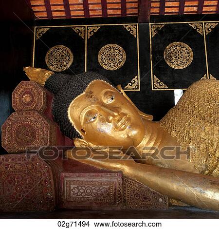 Golden statue of reclining Buddha at Wat Chedi Luang, Chiang Mai, Thailand View Large Photo Image Picture - Golden statue of reclining Buddha at Wat Chedi Luang, Chiang Mai, Thailand. Fotosearch