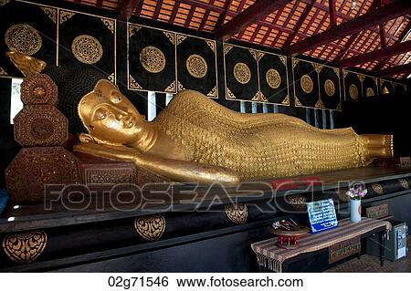 Golden statue of reclining Buddha at Wat Chedi Luang, Chiang Mai, Thailand View Large Photo Image Stock Photograph - Golden statue of reclining Buddha at Wat Chedi Luang, Chiang Mai, Thailand. Fotosearch