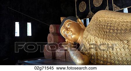 Golden statue of reclining Buddha at Wat Chedi Luang, Chiang Mai, Thailand View Large Photo Image Stock Photography - Golden statue of reclining Buddha at Wat Chedi Luang, Chiang Mai, Thailand. Fotosearch