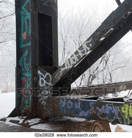 Graffiti on steel post with snow View Large Photo Image Stock Photo - Graffiti on steel post with snow. Fotosearch