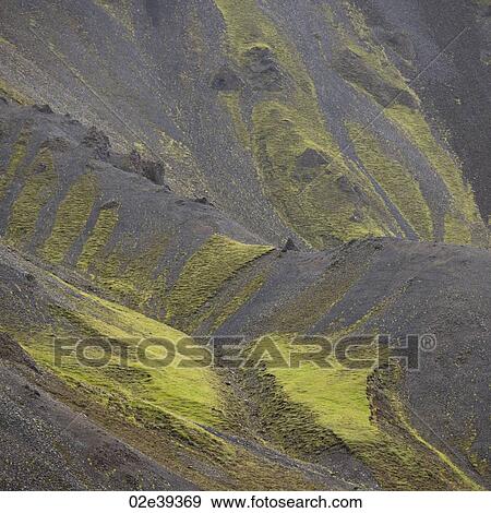 Grass covered volcanic hillside View Large Photo Image Stock Photo - Grass covered volcanic hillside. Fotosearch