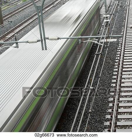 High angle view of a train running on track, Tokyo, Japan View Large Photo Image Stock Image - High angle view of a train running on track, Tokyo, Japan. Fotosearch