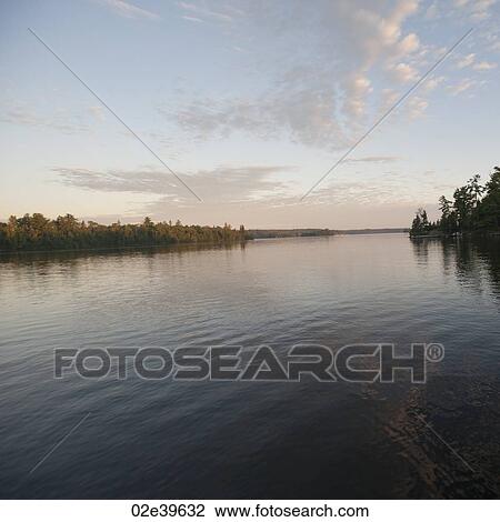 Horizon at dusk at Lake of the Woods, Ontario View Large Photo Image Stock Image - Horizon at dusk at Lake of the Woods, Ontario. Fotosearch
