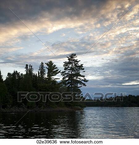 Horizon at dusk at Lake of the Woods, Ontario View Large Photo Image Stock Photograph - Horizon at dusk at Lake of the Woods, Ontario. Fotosearch