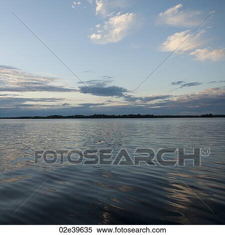 Horizon at dusk at Lake of the Woods, Ontario View Large Photo Image Stock Photography - Horizon at dusk at Lake of the Woods, Ontario. Fotosearch