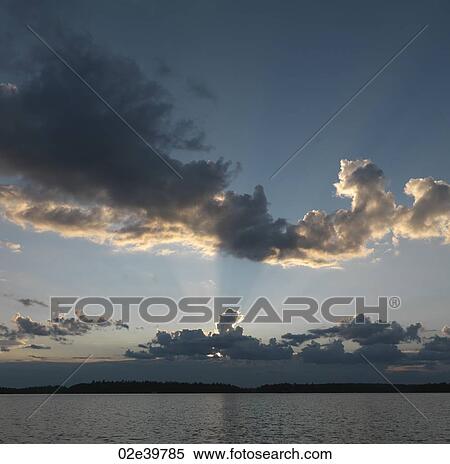 Stock Photography - Horizon at dusk in Lake of the Woods, Ontario. Fotosearch