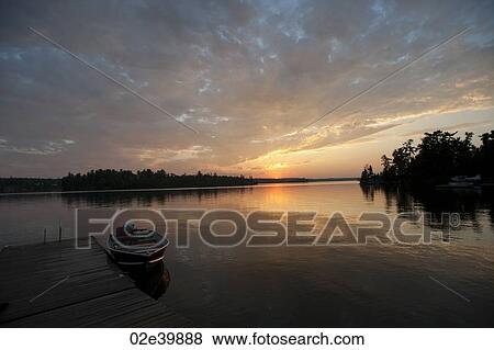 Horizon at sunset in Lake of the Woods, Ontario View Large Photo Image Stock Photo - Horizon at sunset in Lake of the Woods, Ontario. Fotosearch