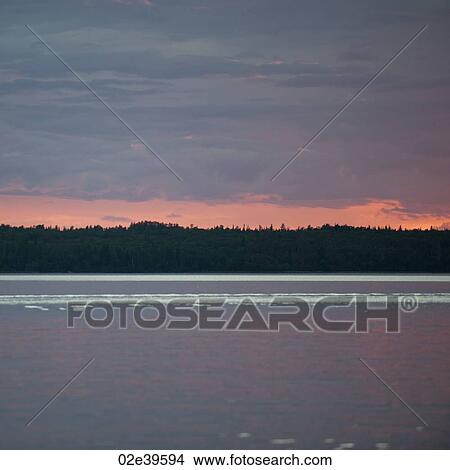 Horizon sky at sunset in Lake of the Woods, Ontario View Large Photo Image Picture - Horizon sky at sunset in Lake of the Woods, Ontario. Fotosearch