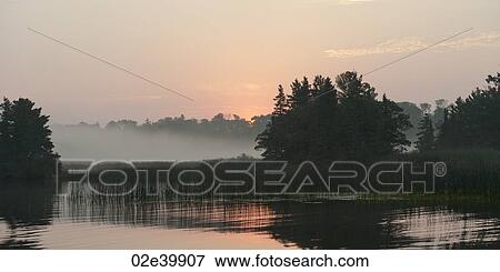 Horizon sky at twilight in Lake of the Woods, Ontario View Large Photo Image Stock Photo - Horizon sky at twilight in Lake of the Woods, Ontario. Fotosearch
