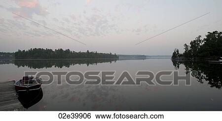 Horizon sky at twilight in Lake of the Woods, Ontario View Large Photo Image Stock Photograph - Horizon sky at twilight in Lake of the Woods, Ontario. Fotosearch