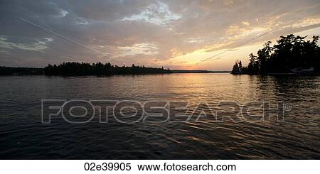 Horizon sky at twilight in Lake of the Woods, Ontario View Large Photo Image Stock Photography - Horizon sky at twilight in Lake of the Woods, Ontario. Fotosearch