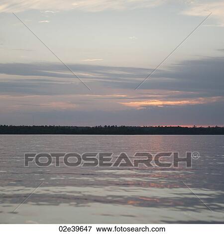 Horizon sky over Lake of the Woods, Ontario View Large Photo Image Stock Photo - Horizon sky over Lake of the Woods, Ontario. Fotosearch