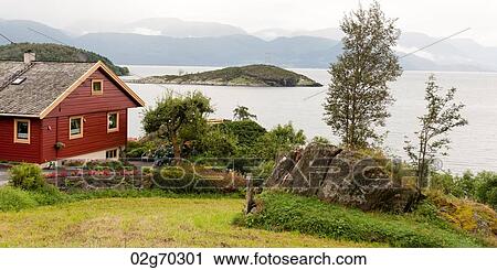 House at waterfront, Hardanger, Hardangerfjord, Hardangervidda, Hardanger, Norway View Large Photo Image Stock Image - House at waterfront, Hardanger, Hardangerfjord, Hardangervidda, Hardanger, Norway. Fotosearch