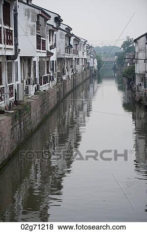 Houses along a creek, Suzhou, Jiangsu Province, China View Large Photo Image Stock Photo - Houses along a creek, Suzhou, Jiangsu Province, China. Fotosearch